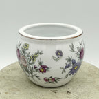 Hand Painted Porcelain Urn With Floral Motif