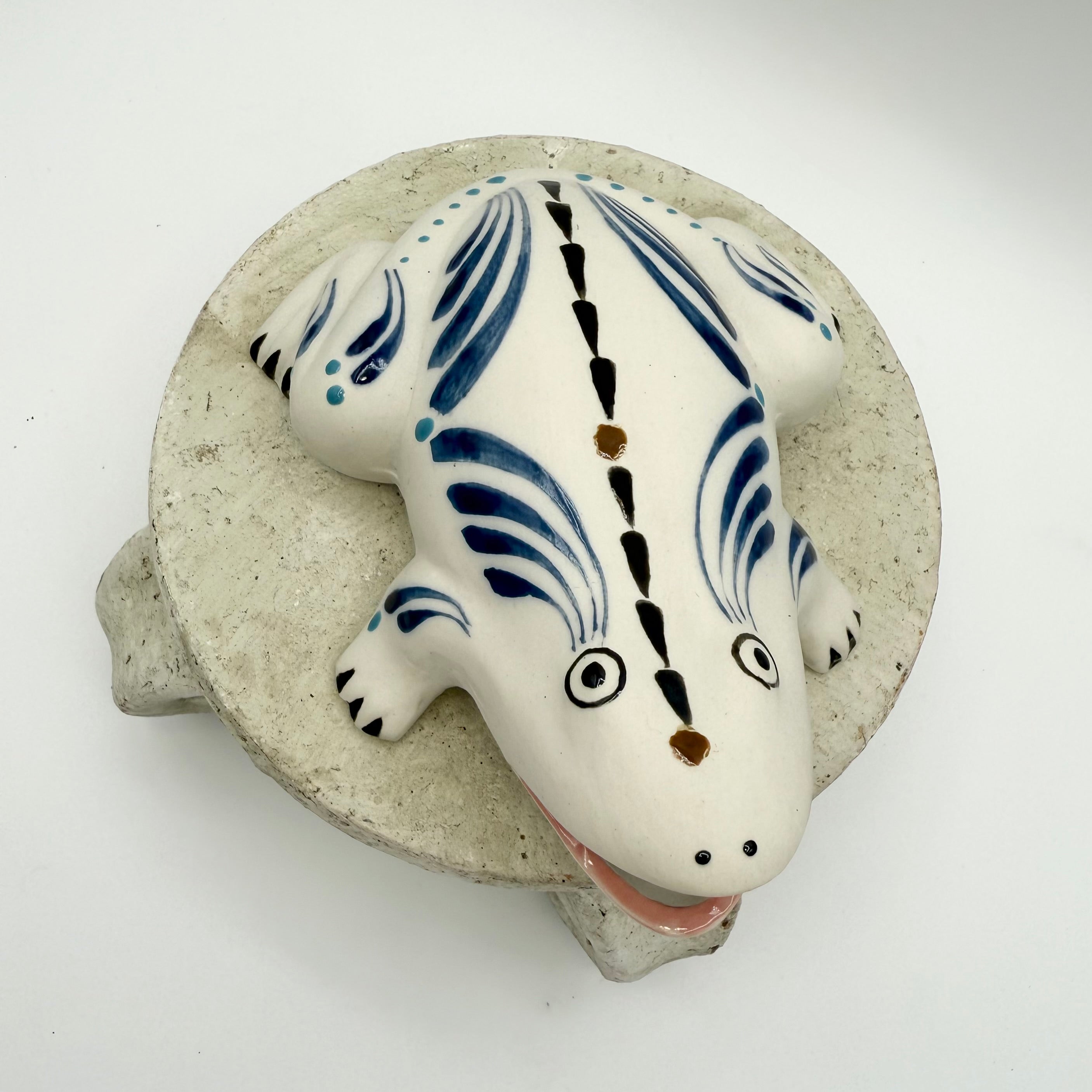 Vintage Mexican hand painted ceramic frog wall pocket vase in blue and black. Playful wall decor collectible.