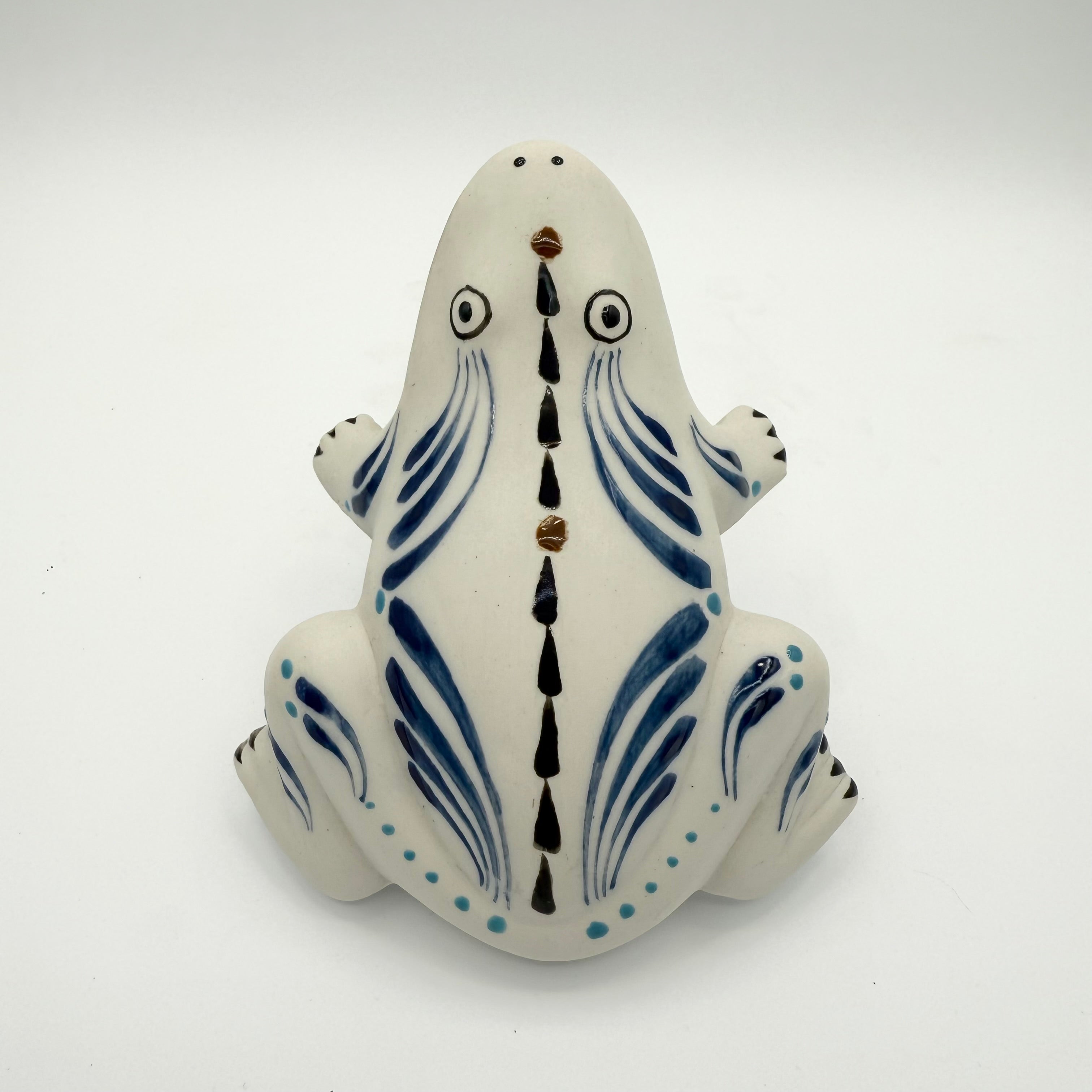 Vintage Mexican hand painted ceramic frog wall pocket vase in blue and black. Playful wall decor collectible.