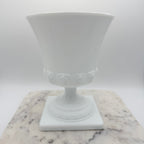 Vintage white milk glass urn with Greek key and leaf motif. Elegant pedestal vase collectible in excellent condition.