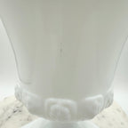 Vintage white milk glass urn with Greek key and leaf motif. Elegant pedestal vase collectible in excellent condition.