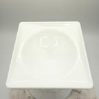 Vintage white milk glass urn with Greek key and leaf motif. Elegant pedestal vase collectible in excellent condition.