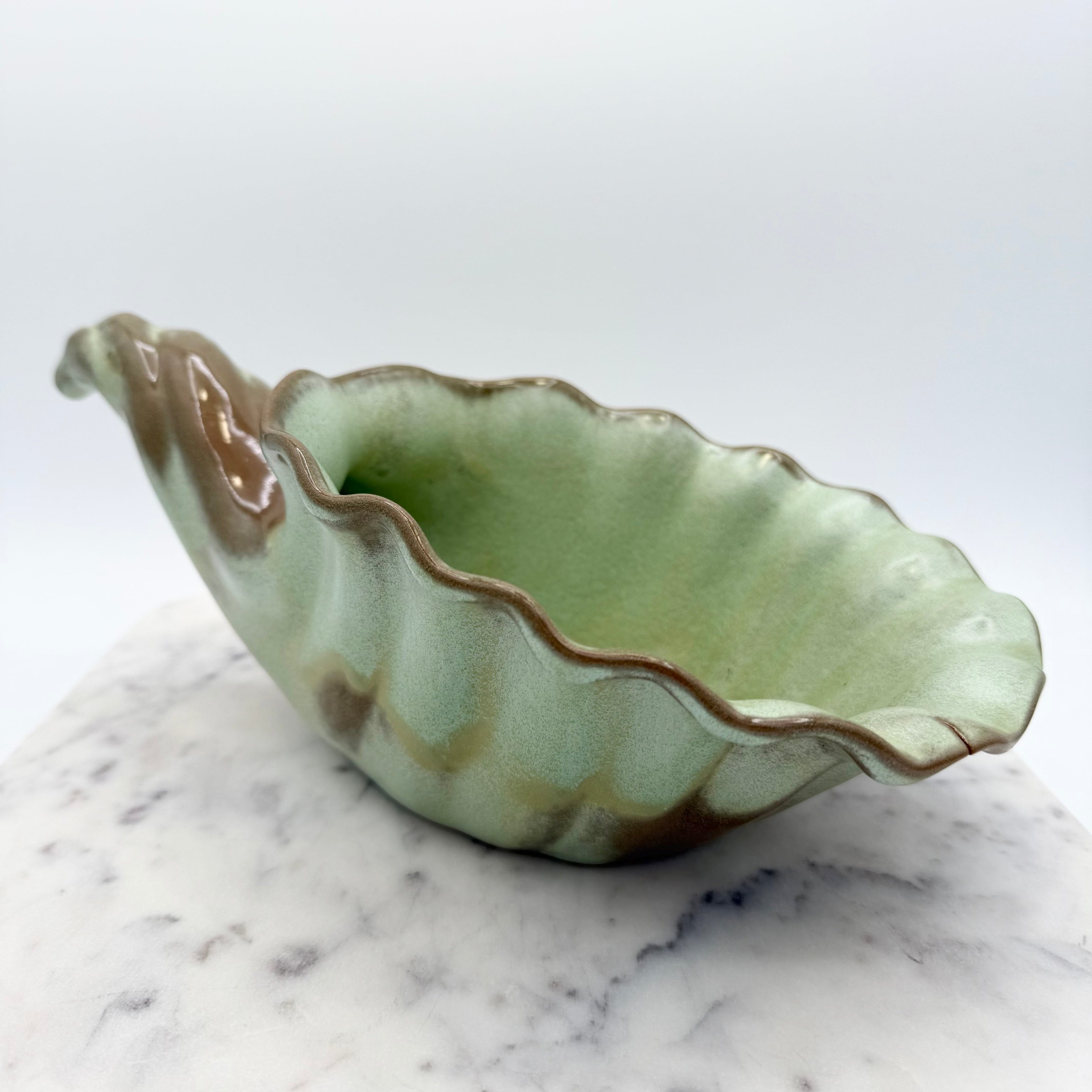 Vintage Frankoma Pottery cornucopia in green and brown glaze. Marked 'Frankoma 222'. Excellent collectible seasonal decor.