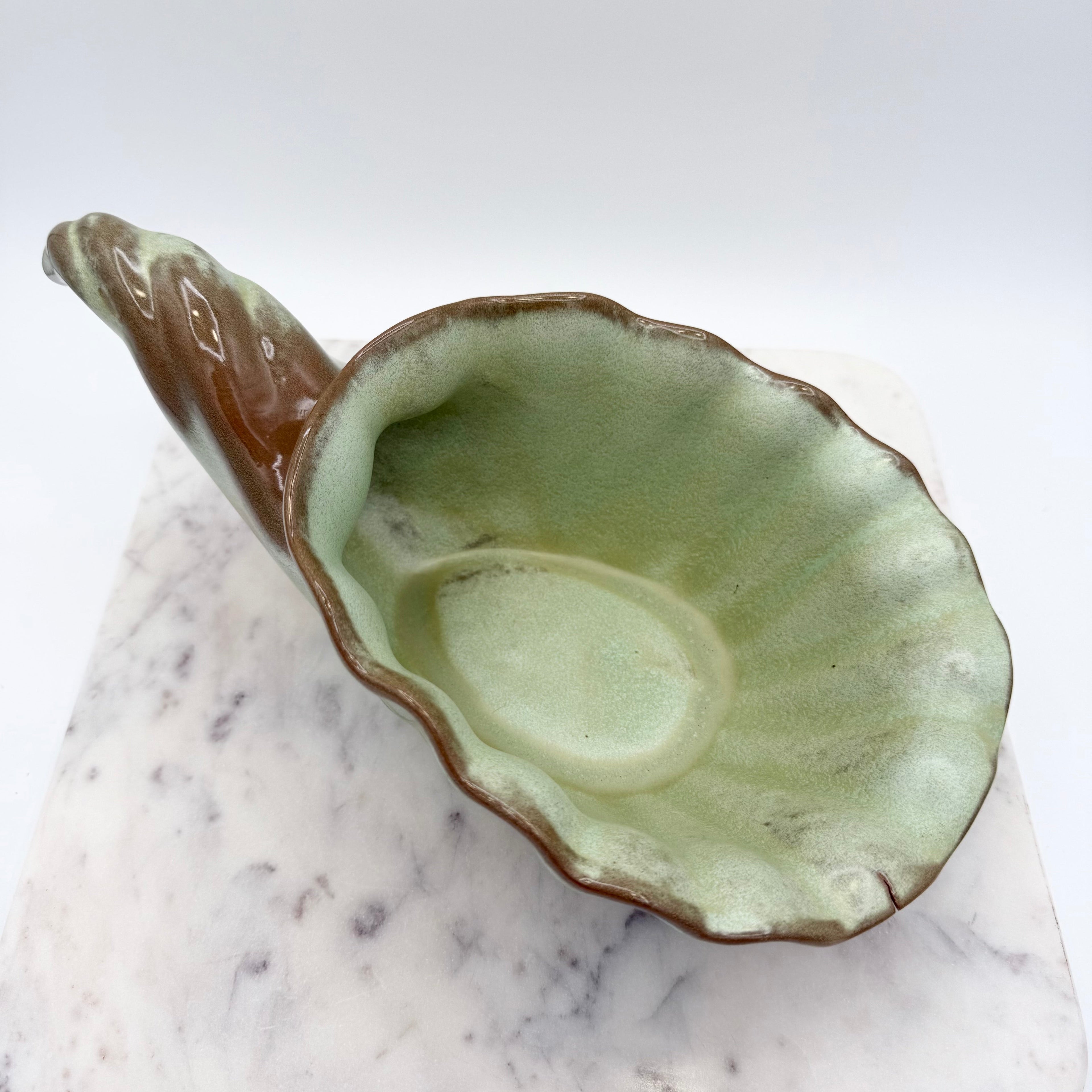 Vintage Frankoma Pottery cornucopia in green and brown glaze. Marked 'Frankoma 222'. Excellent collectible seasonal decor.
