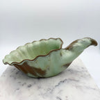 Vintage Frankoma Pottery cornucopia in green and brown glaze. Marked 'Frankoma 222'. Excellent collectible seasonal decor.