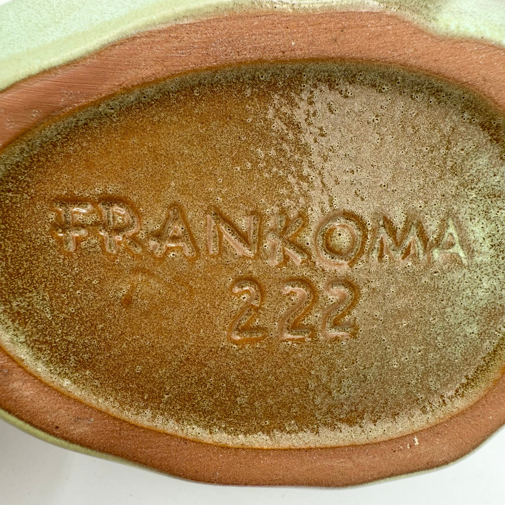 Vintage Frankoma Pottery cornucopia in green and brown glaze. Marked 'Frankoma 222'. Excellent collectible seasonal decor.
