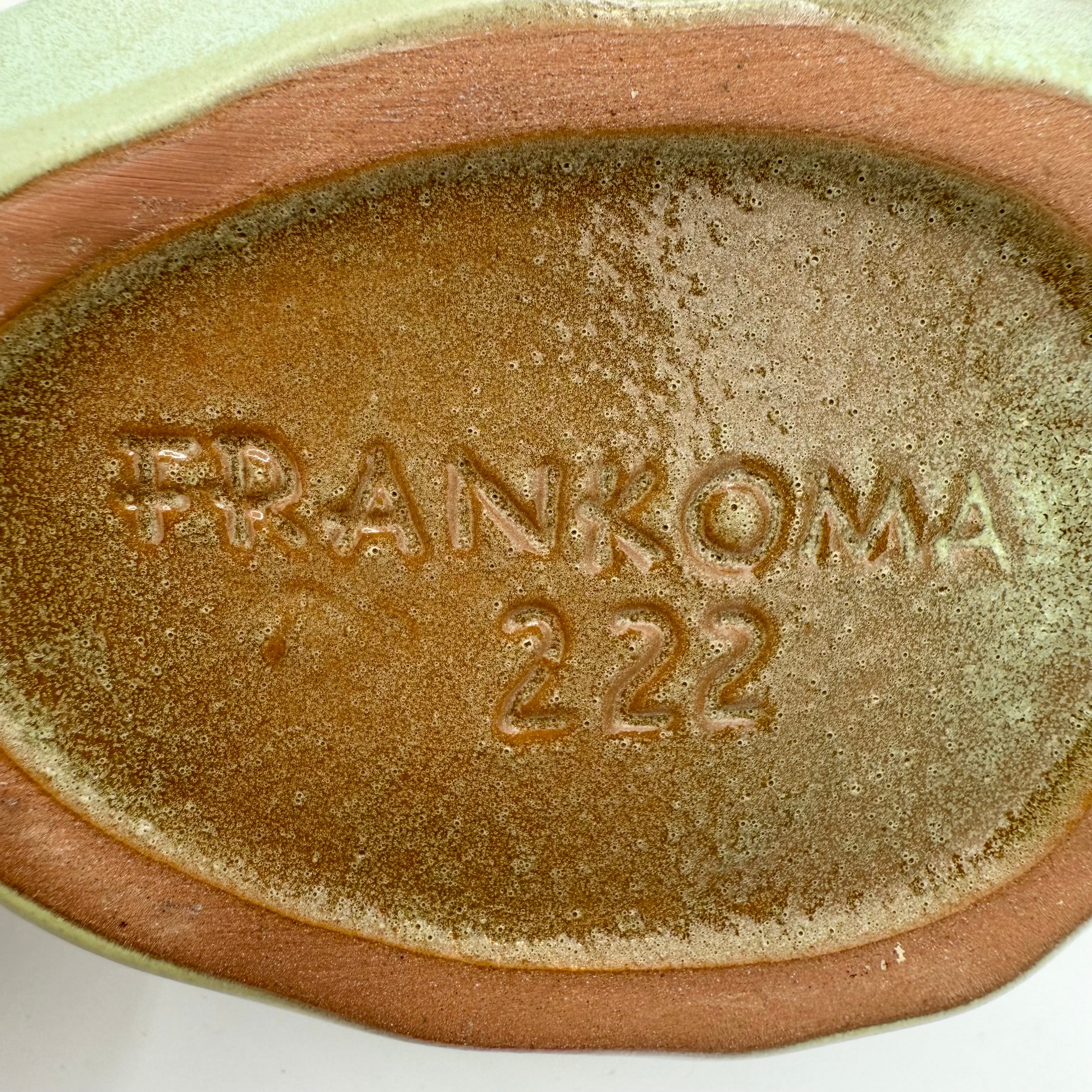 Vintage Frankoma Pottery cornucopia in green and brown glaze. Marked 'Frankoma 222'. Excellent collectible seasonal decor.