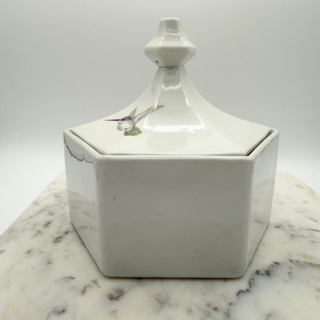Vintage ceramic lidded box with hand painted peony blossoms. Elegant floral collectible for display or storage.