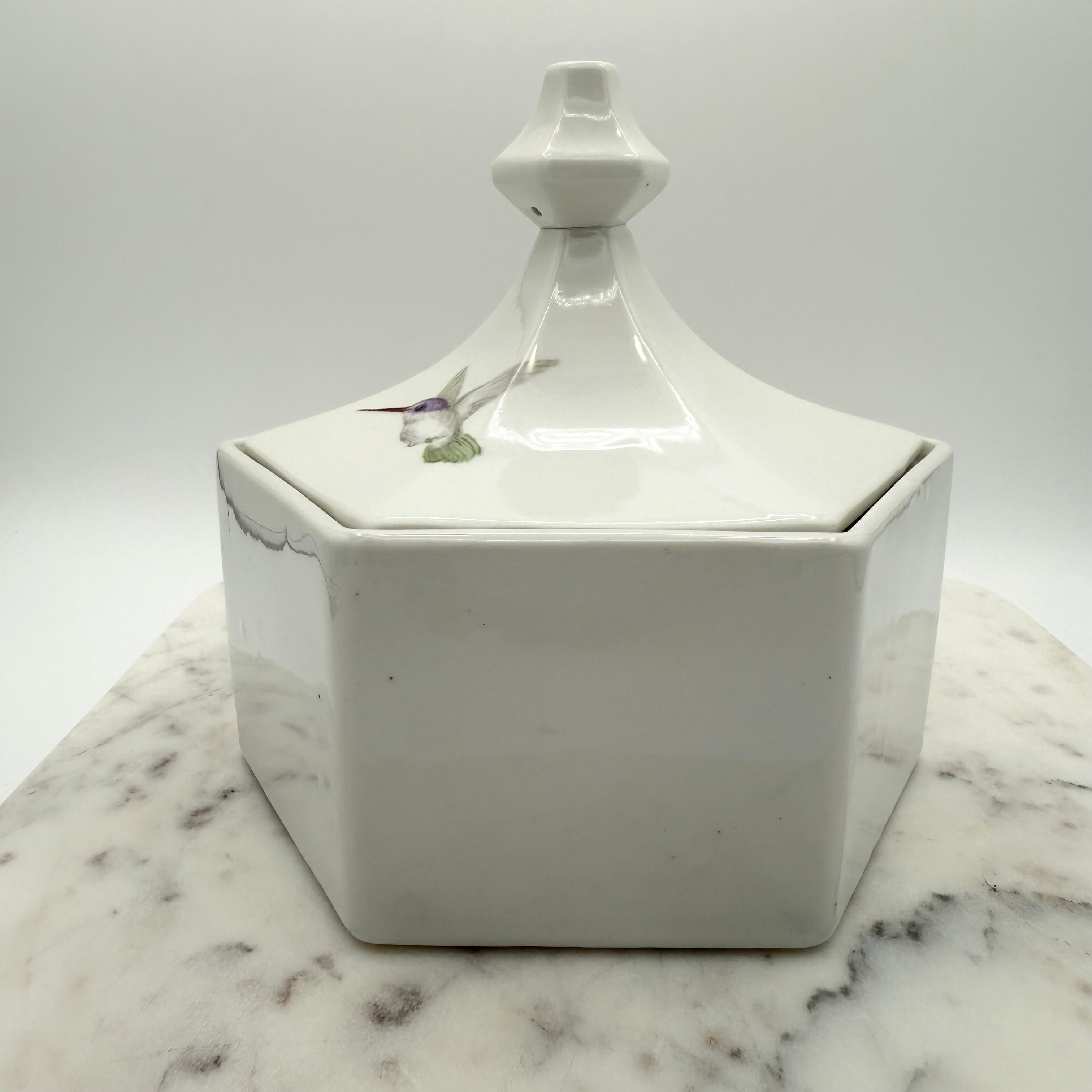 Vintage ceramic lidded box with hand painted peony blossoms. Elegant floral collectible for display or storage.