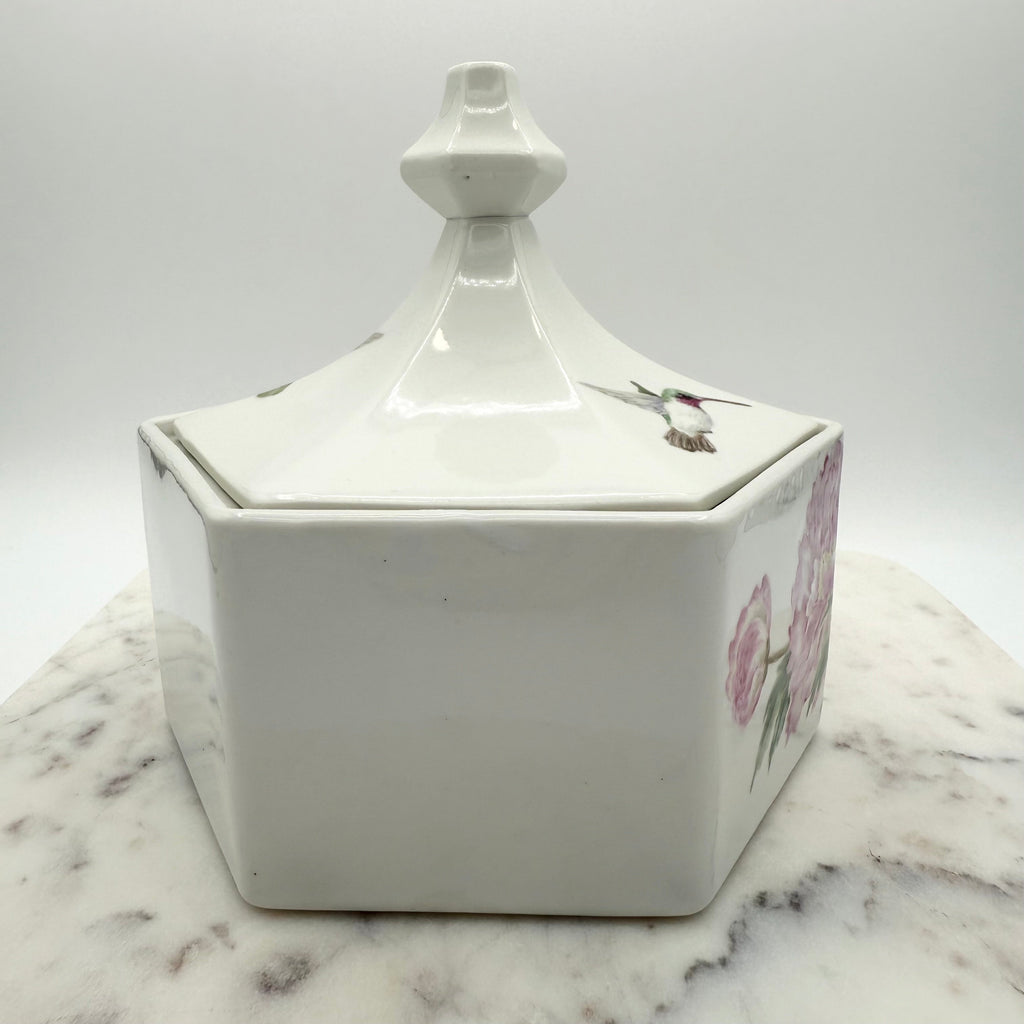 Vintage ceramic lidded box with hand painted peony blossoms. Elegant floral collectible for display or storage.