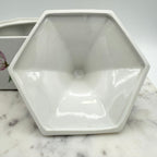 Vintage ceramic lidded box with hand painted peony blossoms. Elegant floral collectible for display or storage.