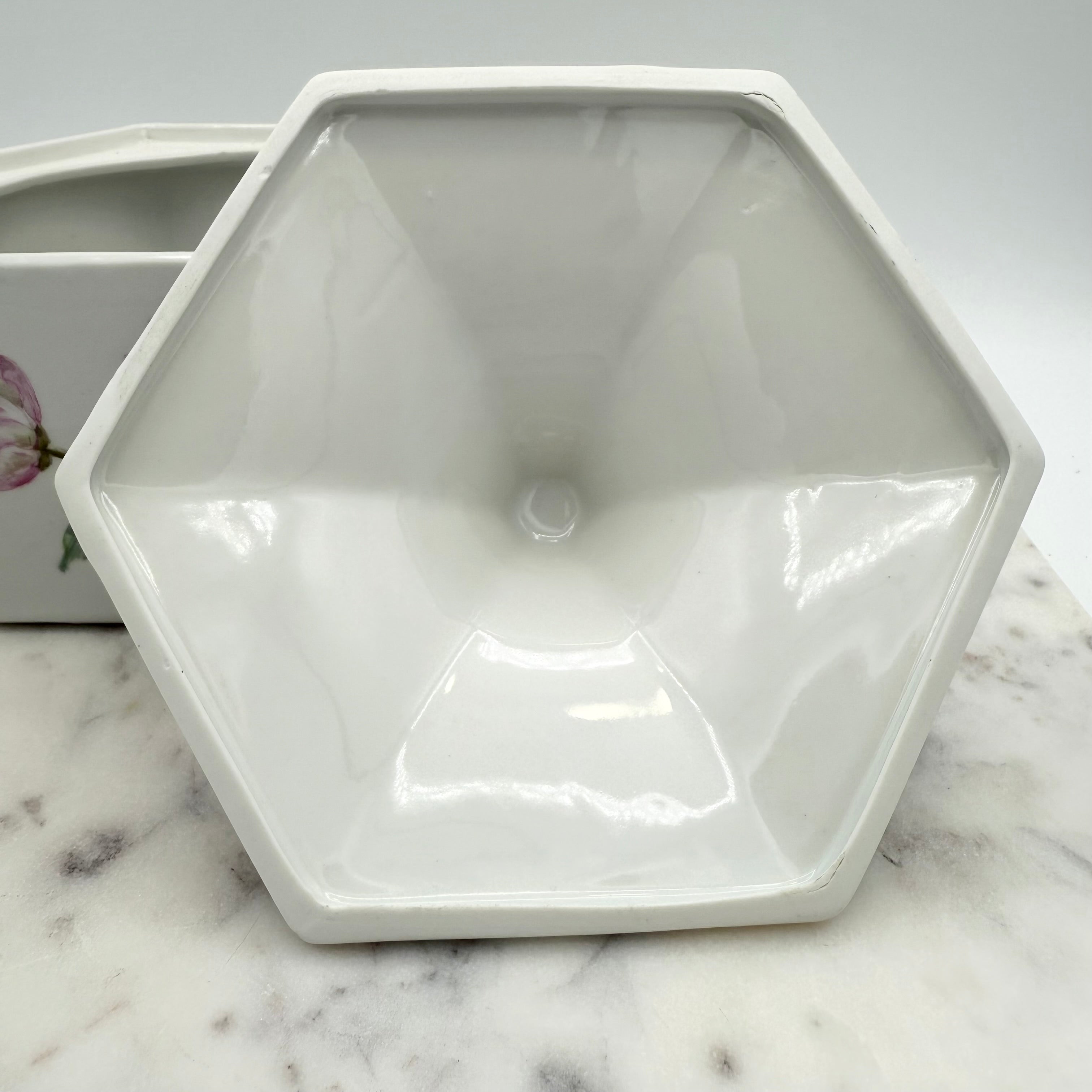 Vintage ceramic lidded box with hand painted peony blossoms. Elegant floral collectible for display or storage.