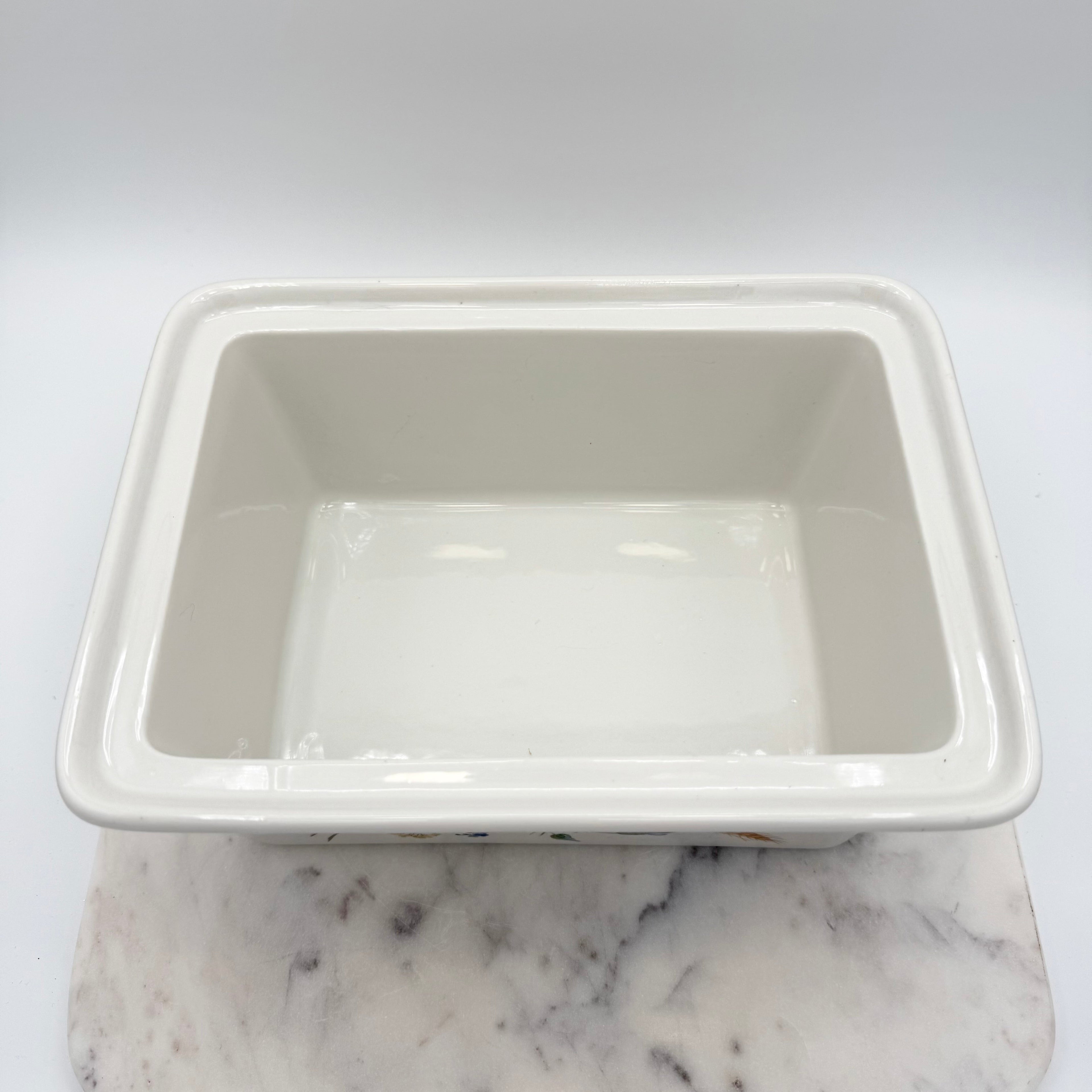 Vintage Hoan porcelain baking dish with wheat and floral decoration, made in France. Beautiful and functional kitchen collectible.