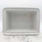 Vintage Hoan porcelain baking dish with wheat and floral decoration, made in France. Beautiful and functional kitchen collectible.