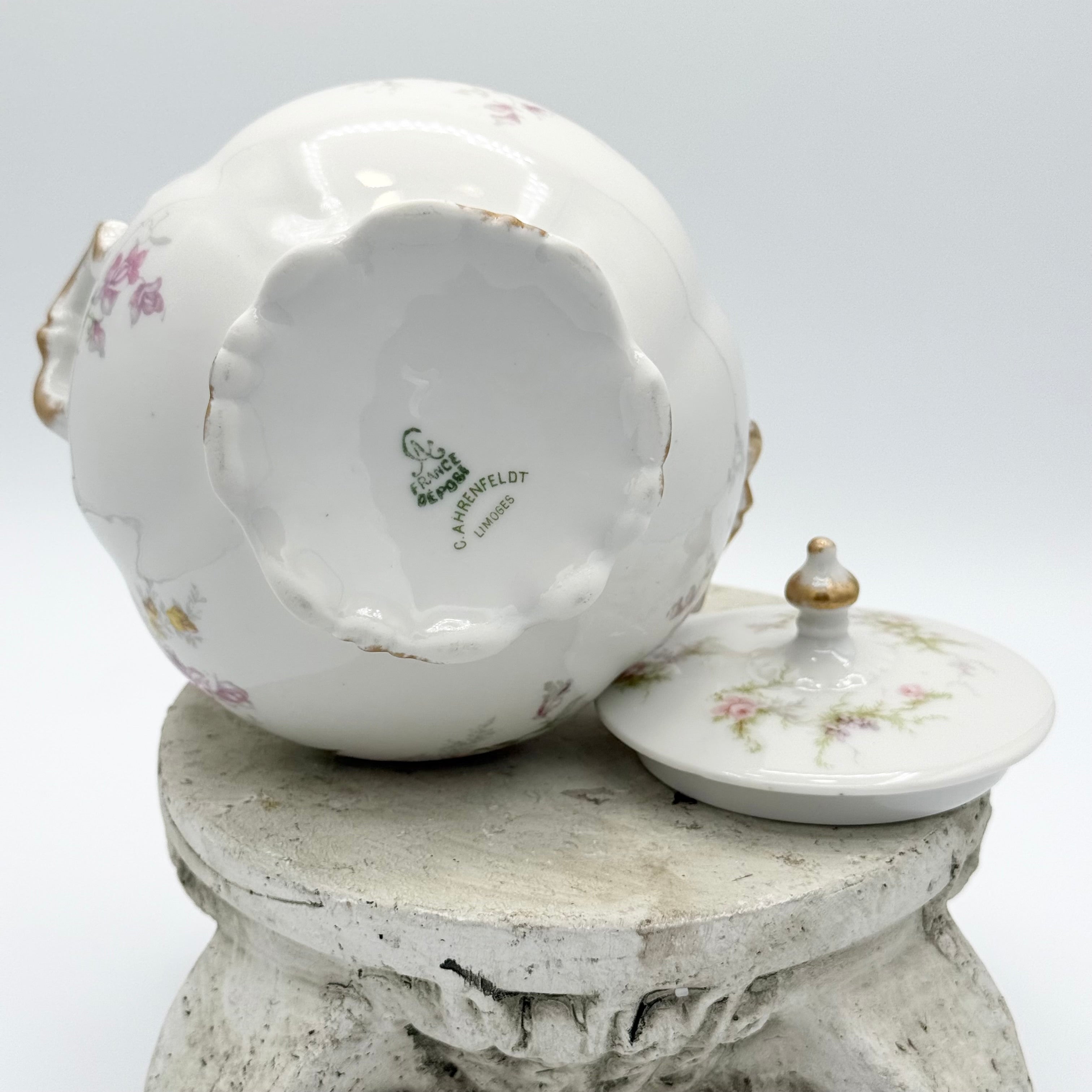 Antique Limoges floral sugar bowl and creamer with gold accents