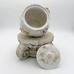 Antique Limoges floral sugar bowl and creamer with gold accents