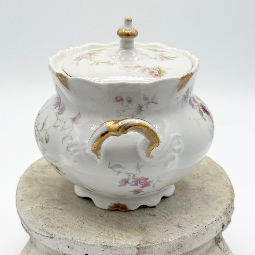 Antique Limoges floral sugar bowl and creamer with gold accents