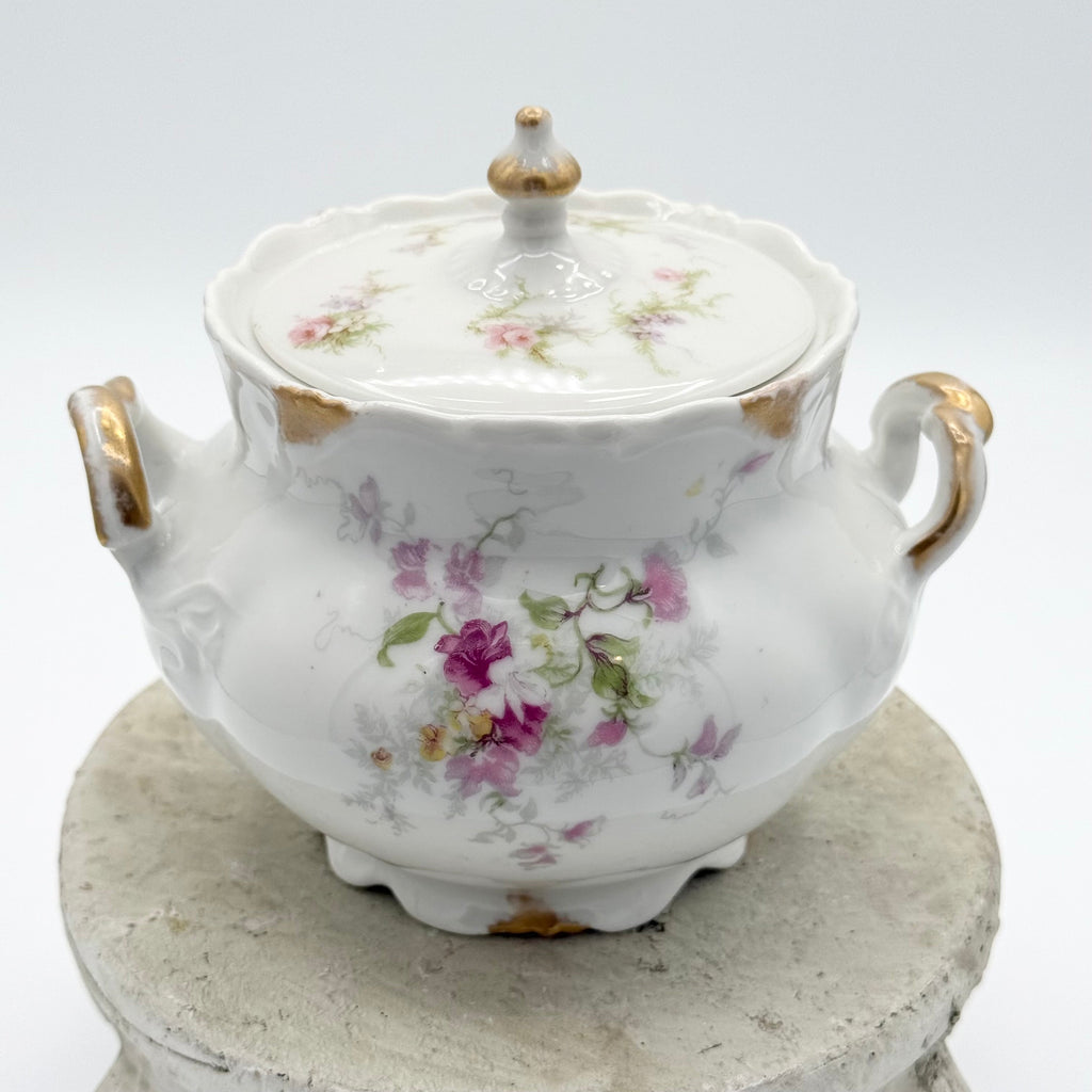 Antique Limoges floral sugar bowl and creamer with gold accents