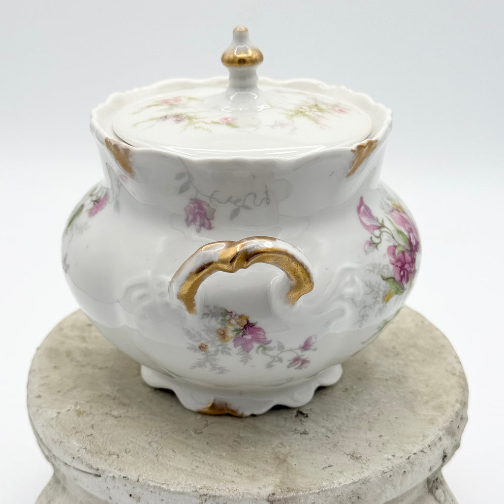 Antique Limoges floral sugar bowl and creamer with gold accents