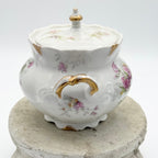 Antique Limoges floral sugar bowl and creamer with gold accents