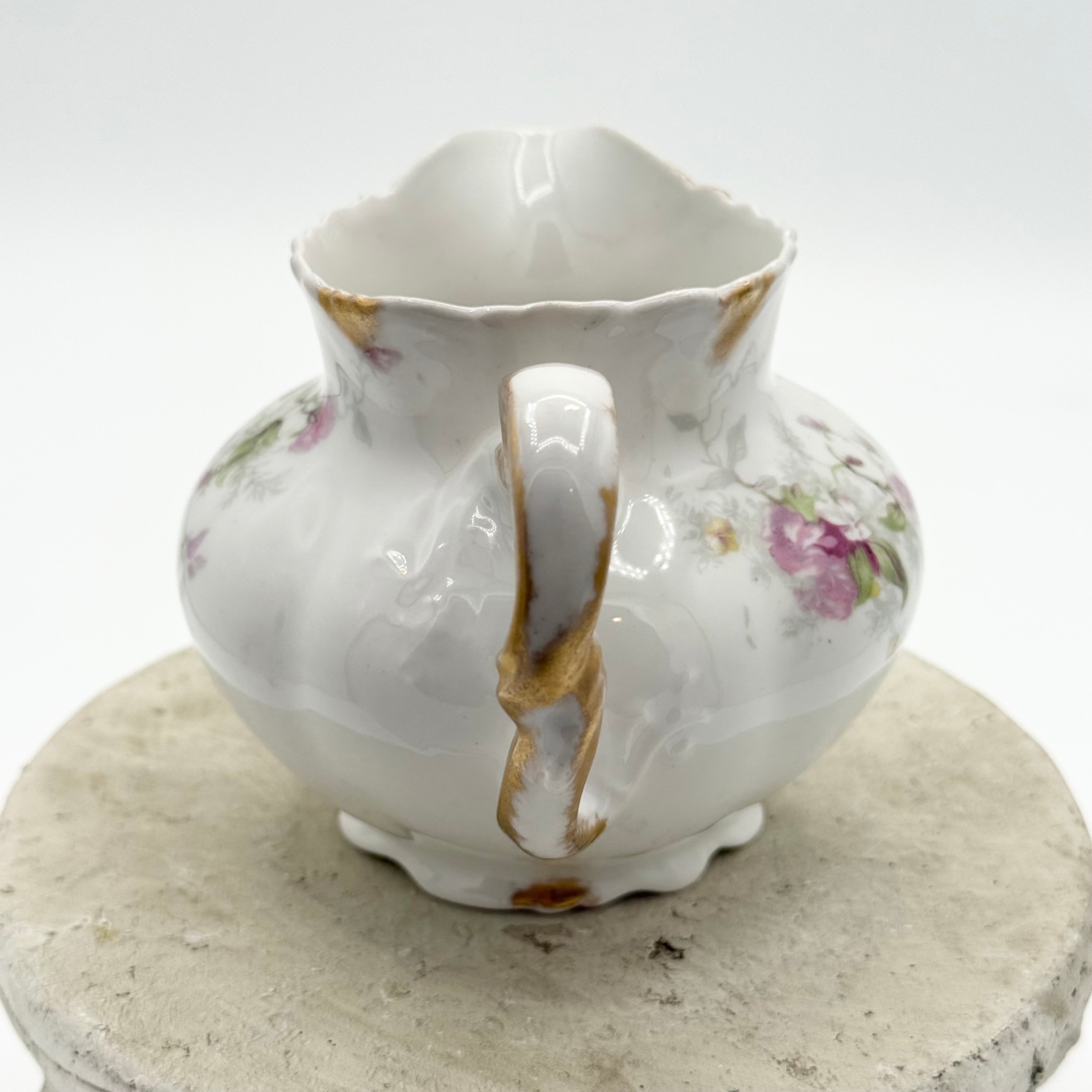 Antique Limoges floral sugar bowl and creamer with gold accents