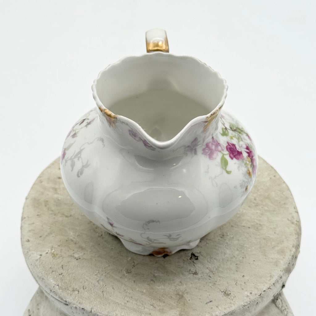 Antique Limoges floral sugar bowl and creamer with gold accents