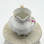 Antique Limoges floral sugar bowl and creamer with gold accents