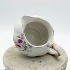 Antique Limoges floral sugar bowl and creamer with gold accents