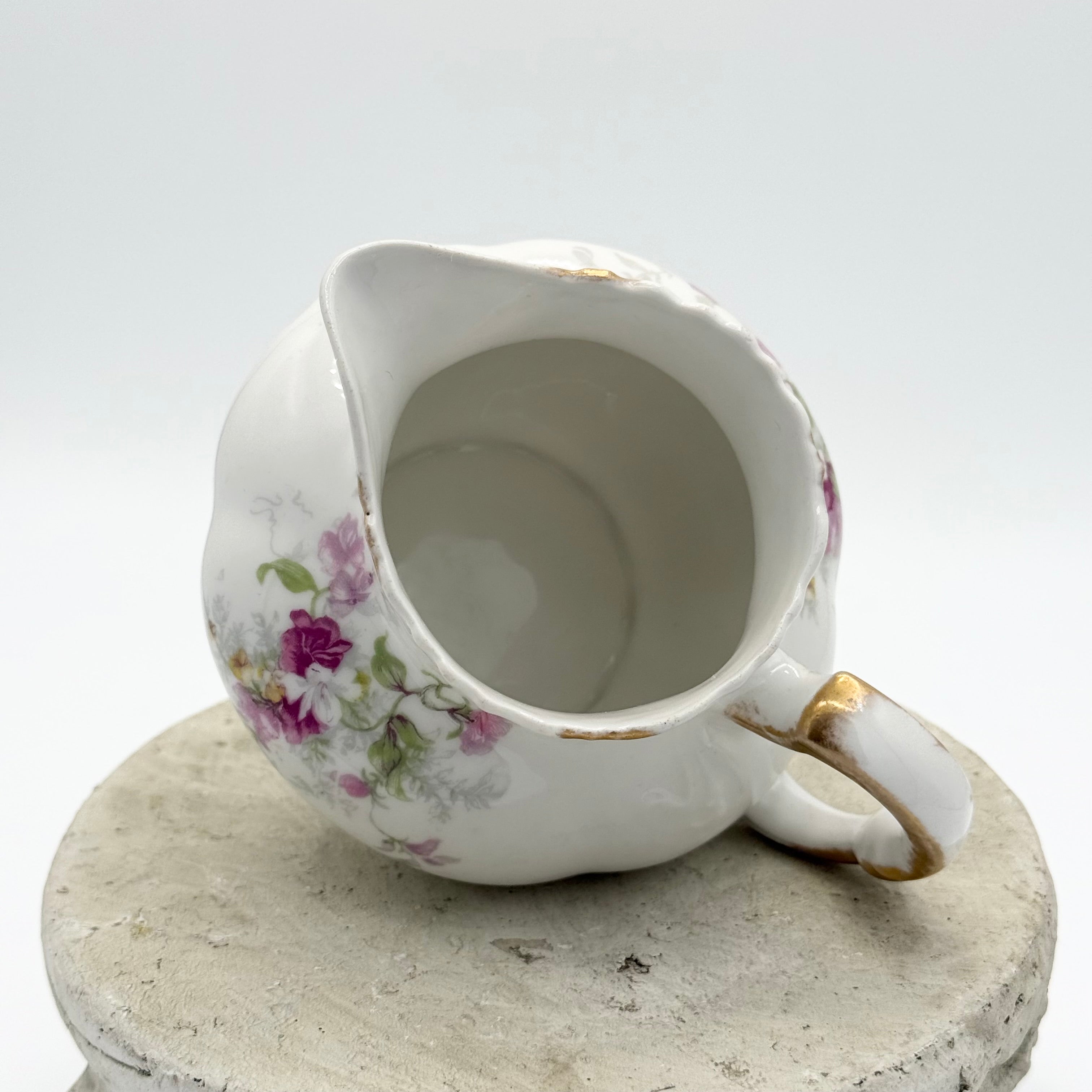 Antique Limoges floral sugar bowl and creamer with gold accents