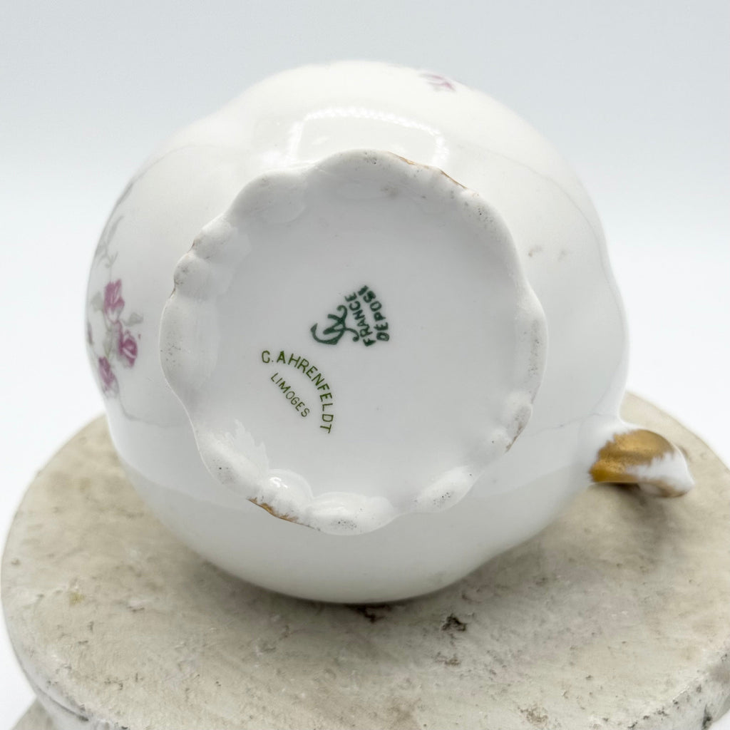 Antique Limoges floral sugar bowl and creamer with gold accents