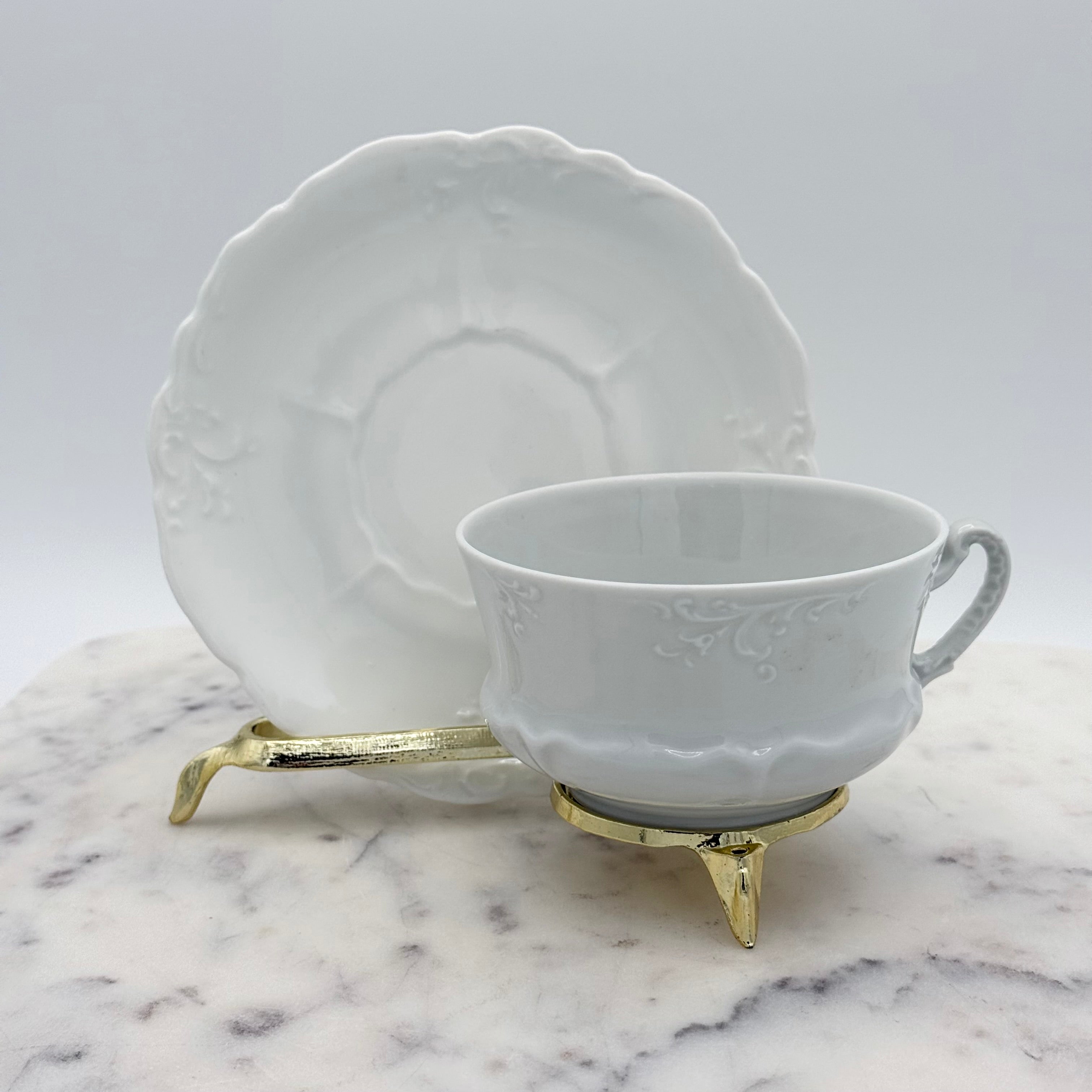 Antique O. & E.G. Royal Austria Ornate White Porcelain Footed Tea Cup and Saucer