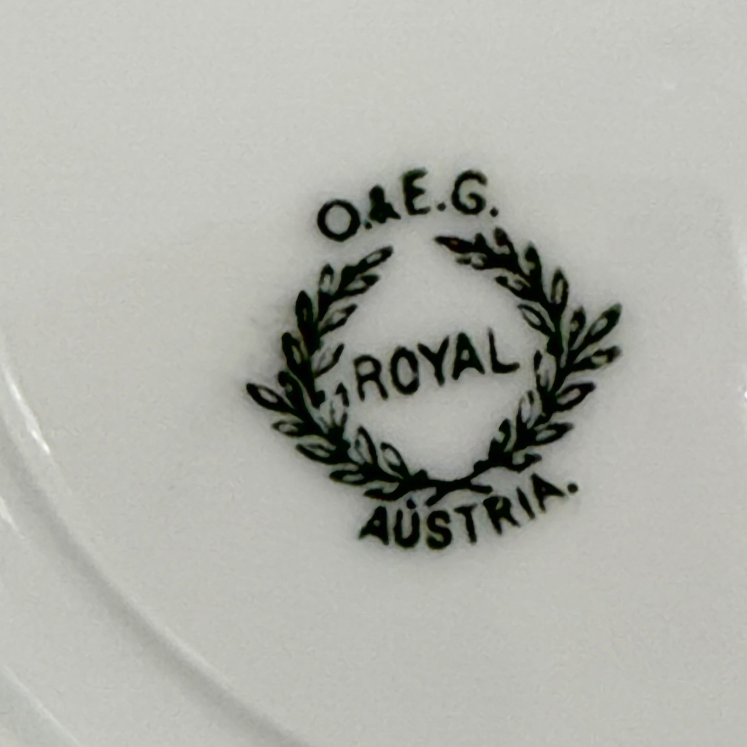 Antique O. & E.G. Royal Austria Ornate White Porcelain Footed Tea Cup and Saucer