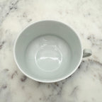 Antique O. & E.G. Royal Austria Ornate White Porcelain Footed Tea Cup and Saucer