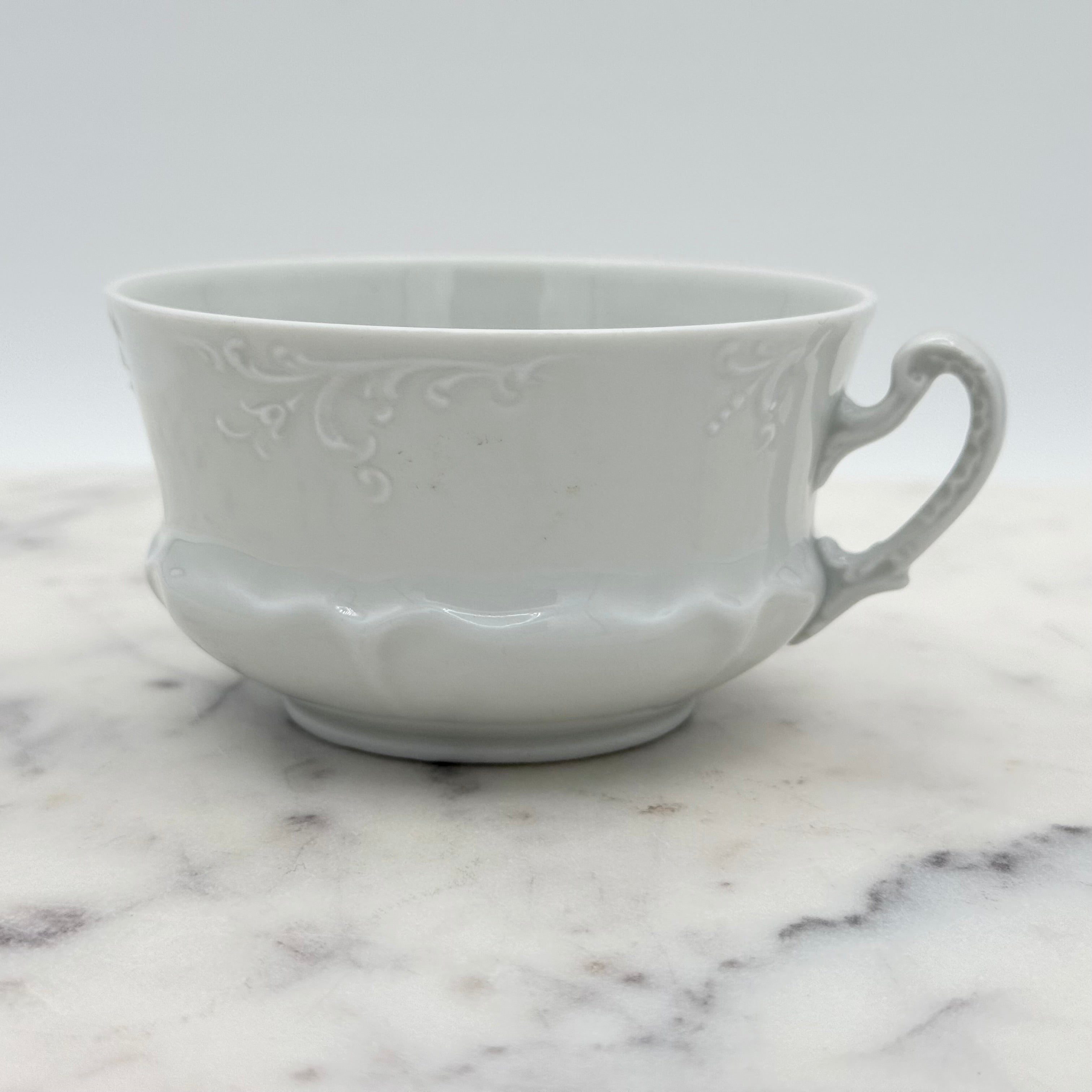 Antique O. & E.G. Royal Austria Ornate White Porcelain Footed Tea Cup and Saucer