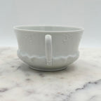 Antique O. & E.G. Royal Austria Ornate White Porcelain Footed Tea Cup and Saucer