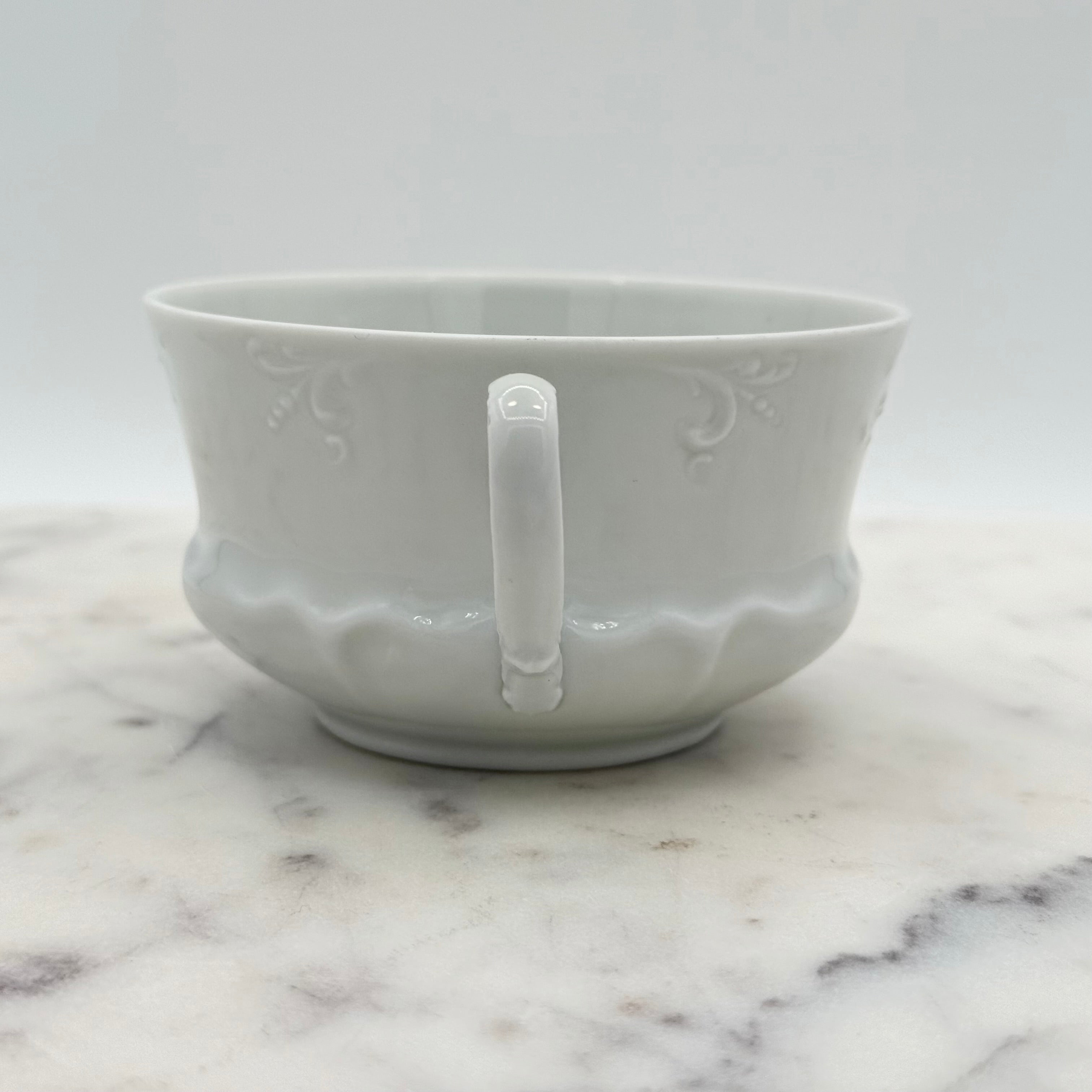Antique O. & E.G. Royal Austria Ornate White Porcelain Footed Tea Cup and Saucer