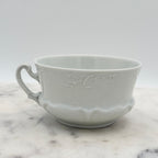 Antique O. & E.G. Royal Austria Ornate White Porcelain Footed Tea Cup and Saucer