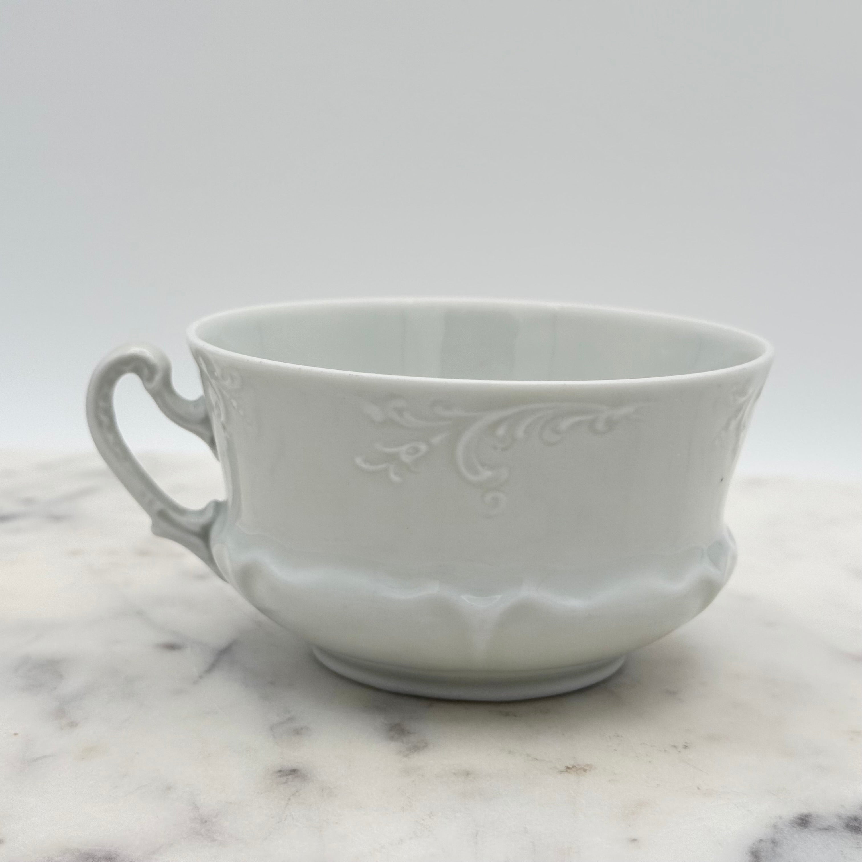 Antique O. & E.G. Royal Austria Ornate White Porcelain Footed Tea Cup and Saucer