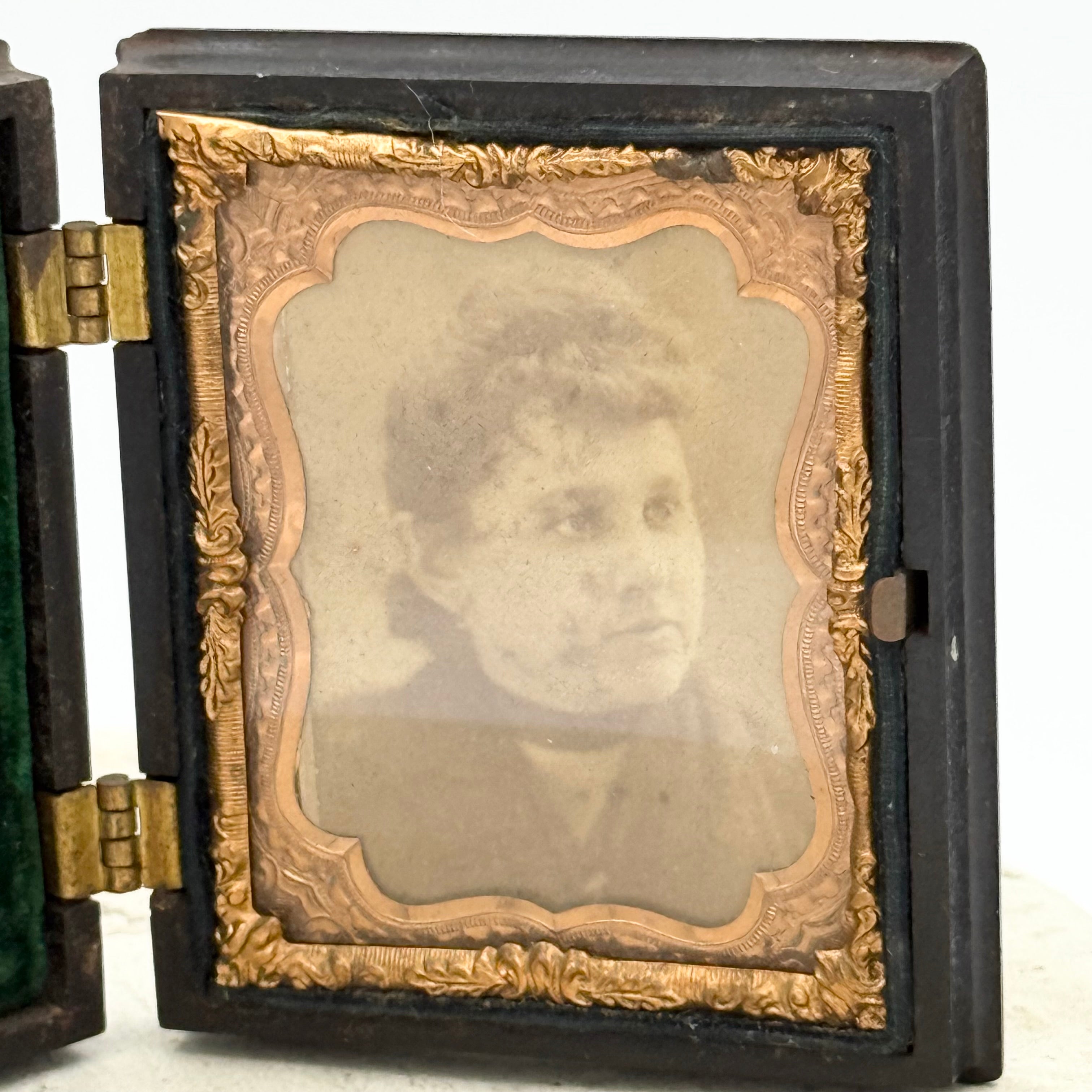 Antique Gutta Percha Frame with Green Velvet Interior and Woman's Photo